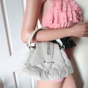 Swarovski off white leather bag with crystal detailing. Worn once.